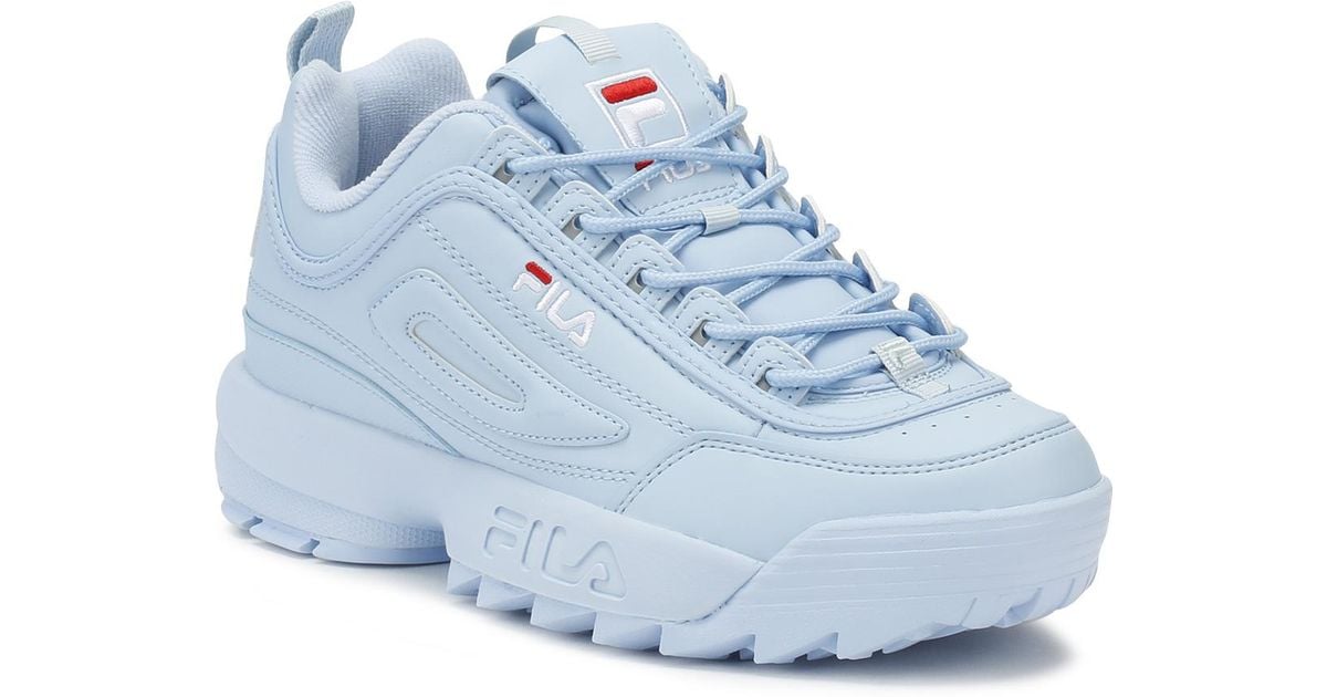 white and blue fila shoes