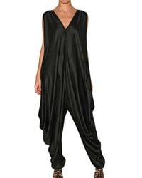 Saint Laurent | Black Fluid Shiny Silk Jersey Jumpsuit | Lyst