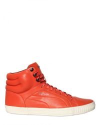 Alexander McQueen X Puma | Orange Metal Logo Plaque Leather High Top Sneakers for Men | Lyst