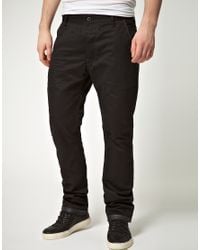 black tapered chinos