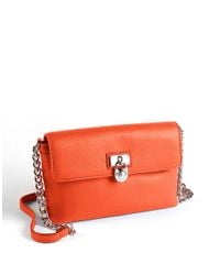 Calvin klein Leather Crossbody Bag in Orange | Lyst