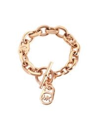 Michael Kors - Pink Heritage Rose Gold-tone Logo-lock Charm Women's Bracelet - Lyst
