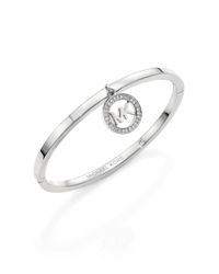 Michael Kors | Metallic Fulton Logo Charm Bangle Bracelet/silvertone | Lyst