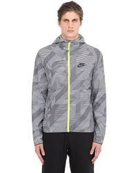 Nike | Gray Packable Nylon Wind Runner Jacket for Men | Lyst