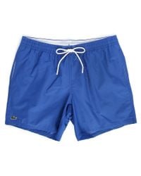 sold out lacoste men s blue logo swim shorts see more lacoste 