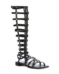 stuart weitzman black gladiator sandals