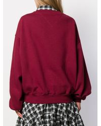 Sweat à logo brodé Tommy Hilfiger en coloris Red