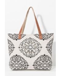 Pia Rossini - Bimini Natural/black Embellished Tassel Canvas Bag - Lyst