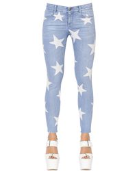 Stella McCartney | Blue Skinny Stars Printed Stretch Denim Jeans | Lyst