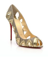 Christian louboutin Circus City Embellished Cut-Out Pumps in Gold ...