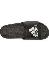lyst adidas originali adilight slide sandalo nero per gli uomini. lyst adidas originali adilight slide sandalo nero per gli uomini.