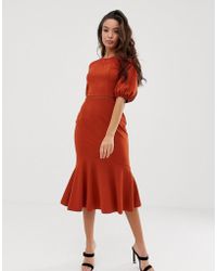 ASOS Vestito midi in misto pizzo con fondo peplo - Arancione