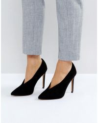 t bar pointed heels