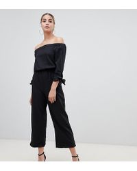 Boohoo Tuta jumpsuit con fondo ampio e scollo alla Bardot nera - Nero