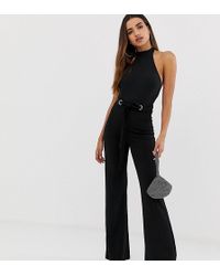 Missguided Pantaloni con fondo ampio e occhielli in vita in crêpe elasticizzato neri - Nero