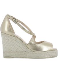 gold and tan wedges