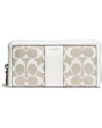 coach wallets white