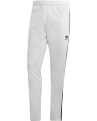 adidas Originals Adicolor Snap Pants in Black for Men Lyst adidas Originals Adicolor Snap Pants in Black for Men Lyst