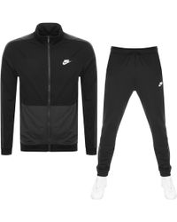 nike standard fit logo tracksuit