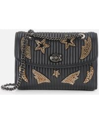 coach quilted backpack