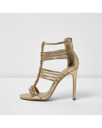 river island black and gold heels