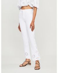 PAIGE Colette High-rise Floral-cutout Flared Jeans - White