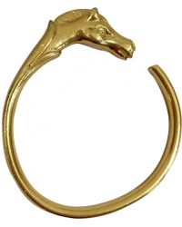 Lyst Hermès Pre Owned Vintage Gold Metal Bracelets In Metallic Hermès Pre Owned Vintage Galop Gold Plated Bracelets Lyst