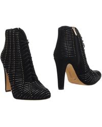 Shop Women's Vince Camuto Boots from $53 | Lyst