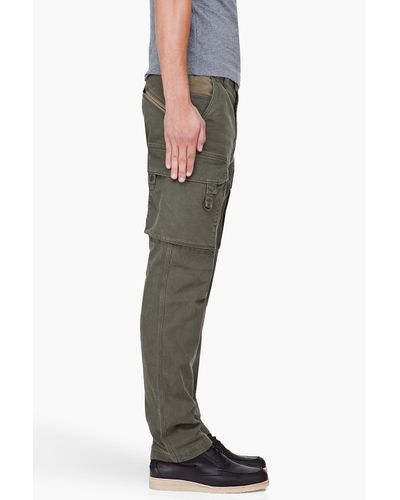 white mountaineering cargo pants