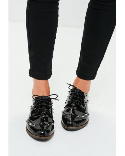 black patent t bar brogues