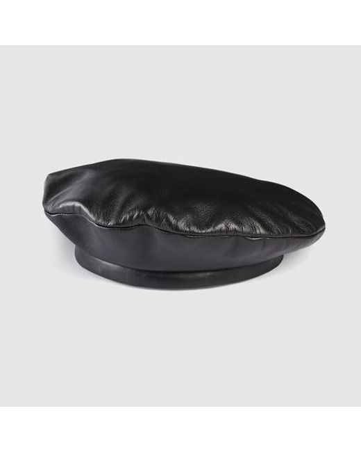 black leather beret