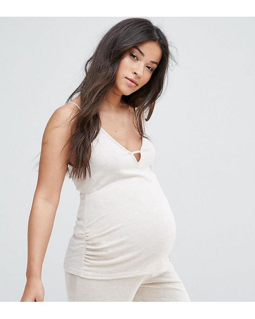 Description Top pack by New Look, Pack of two, Stock up, A wardrobe staple, V-neck, Slim cami straps, Regular cut, Fits you just right. Transforming the coolest looks straight from the catwalk into wardrobe staples, New Look joins the ASOS round up of great British high street brands.