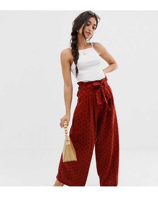 red paperbag waist pants