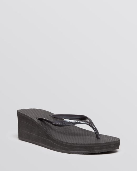 black high wedge flip flops
