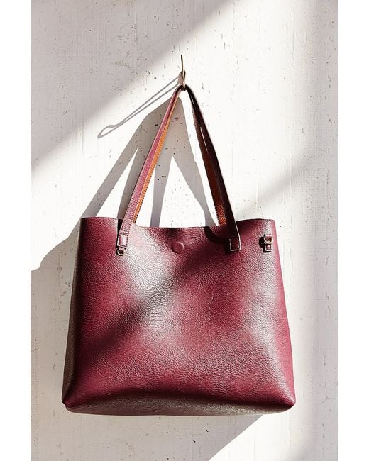 Urban outfitters Reversible Vegan Leather Tote Bag in Purple | Lyst