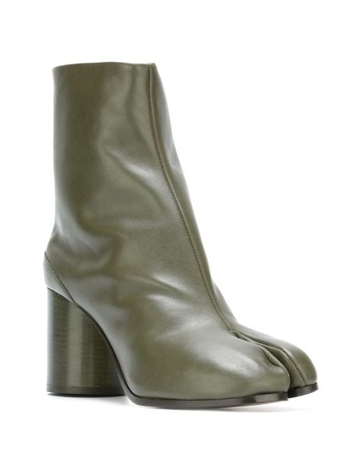 brushed off metallic green tabi boots with plexiglass heels