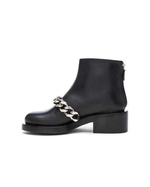 black ankle booties with chains