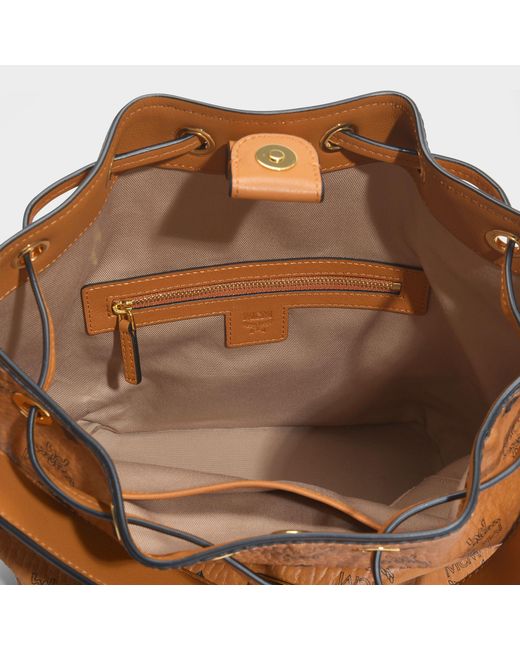 MCM Essential Visetos Original Small Drawstring Bag In Cognac Coated Canvas in Brown - Lyst