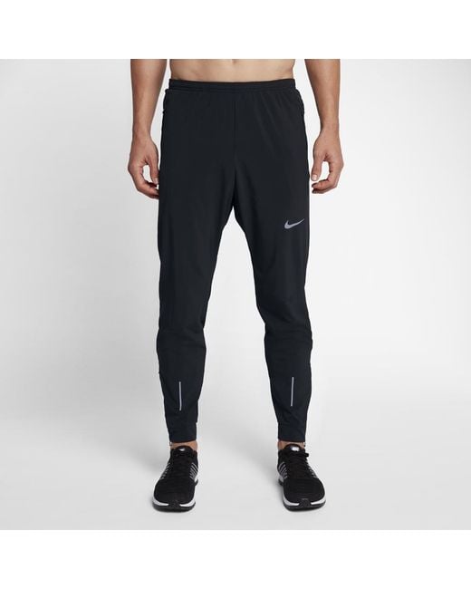 Download Lyst - Nike Essential Men's Woven Running Pants in Black ...