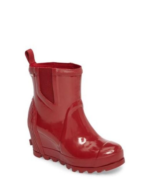 Sorel Joan Glossy Wedge Rain Boot in Red | Lyst