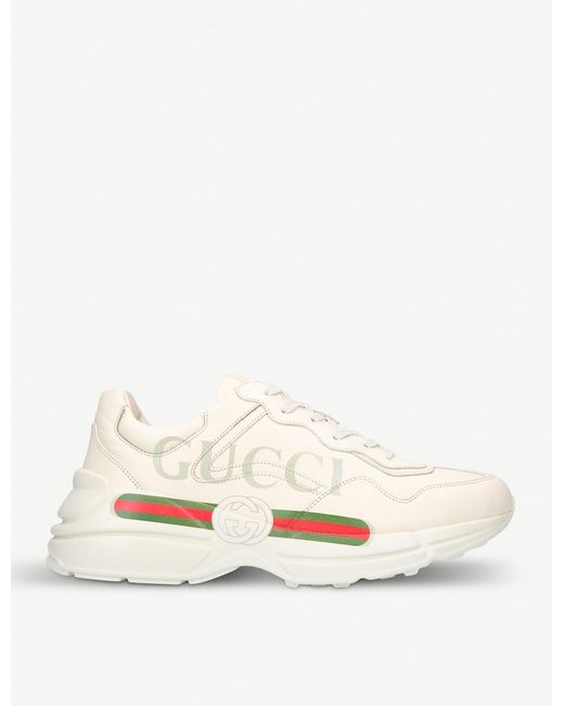 white rhyton gucci logo trainers