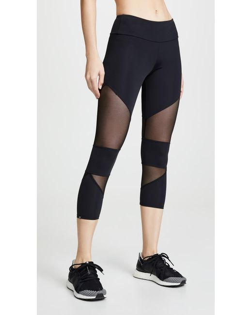 Download Lyst - Onzie Mesh Cutout Capri Leggings in Black