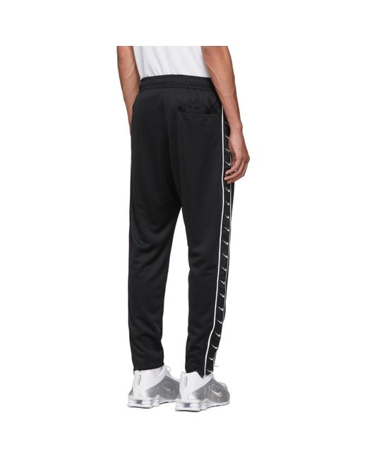 Nike Black Swoosh Tape Track Pants in Black for Men - Lyst