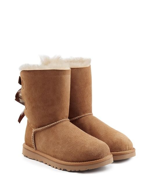 Ugg Mini Bailey Bow Suede Boots in Blue - Save 68% | Lyst