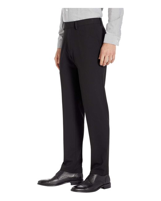 Kenneth Cole Reaction Synthetic Solid Gab Four Way Stretch Slim Fit Dress Pants In Black For Men 