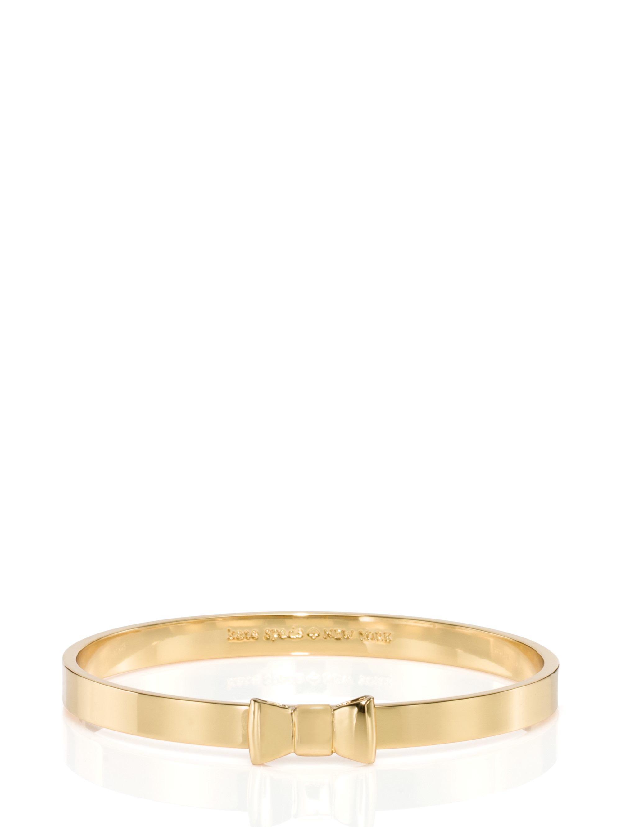 Lyst Kate Spade New York Take A Bow Bangle in Metallic