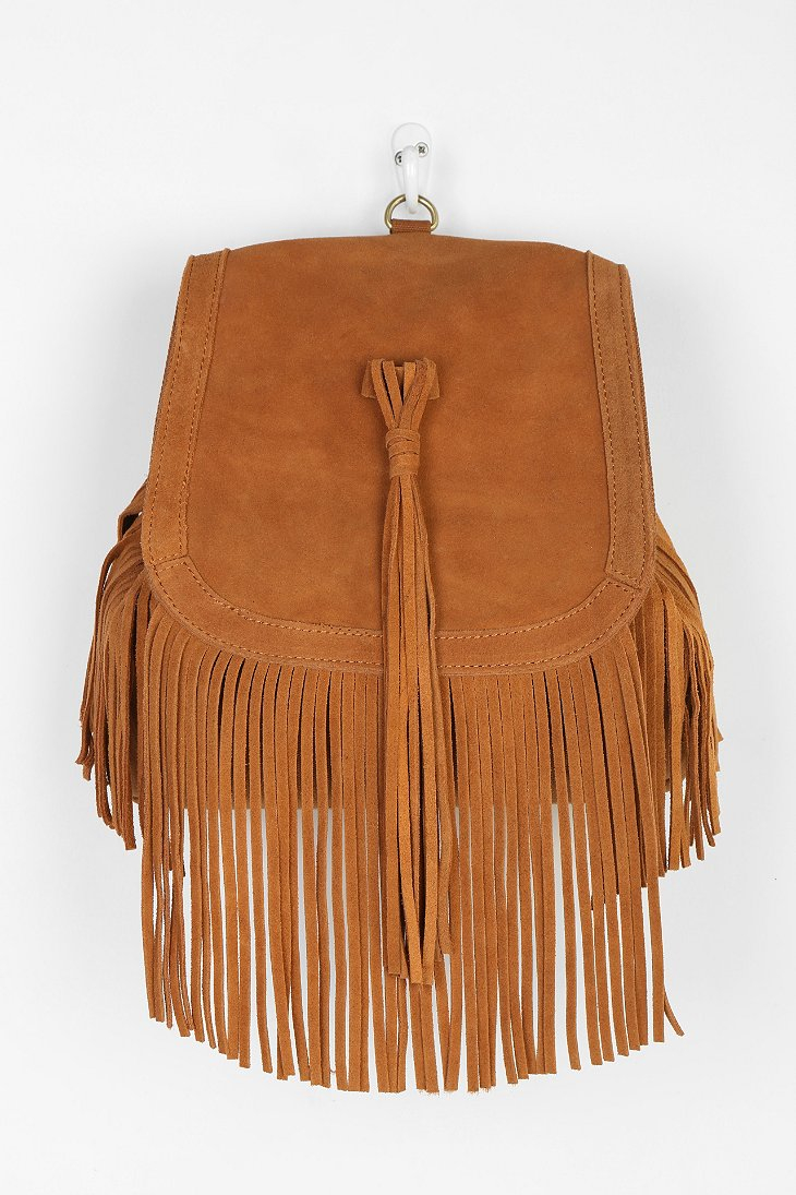 Lyst - Urban Outfitters Angela Suede Fringe Backpack in Brown