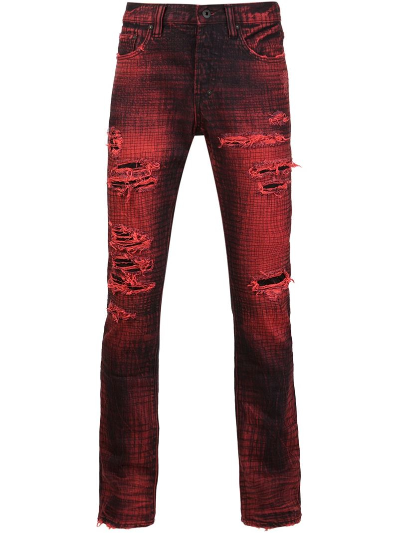 distressed red jeans