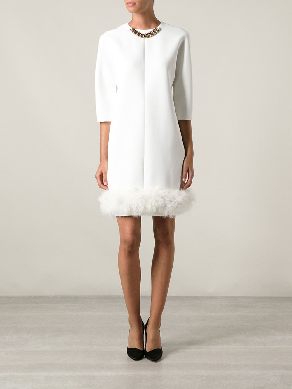 white dress with fur trim