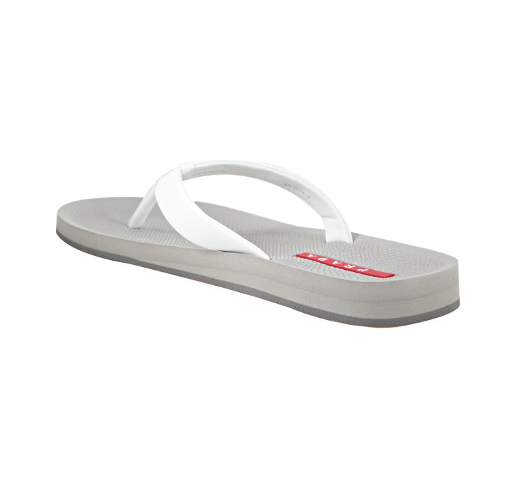 prada flip flops white